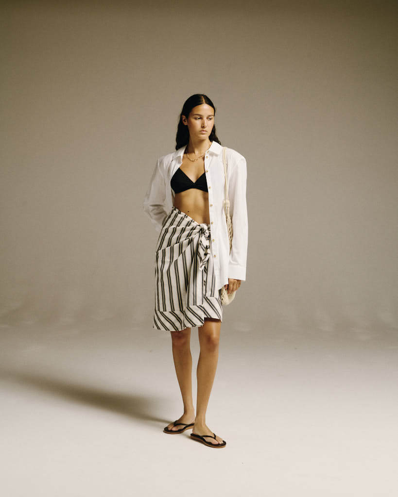 How to style a black triangle bikini for beach, bar, and holiday looks?