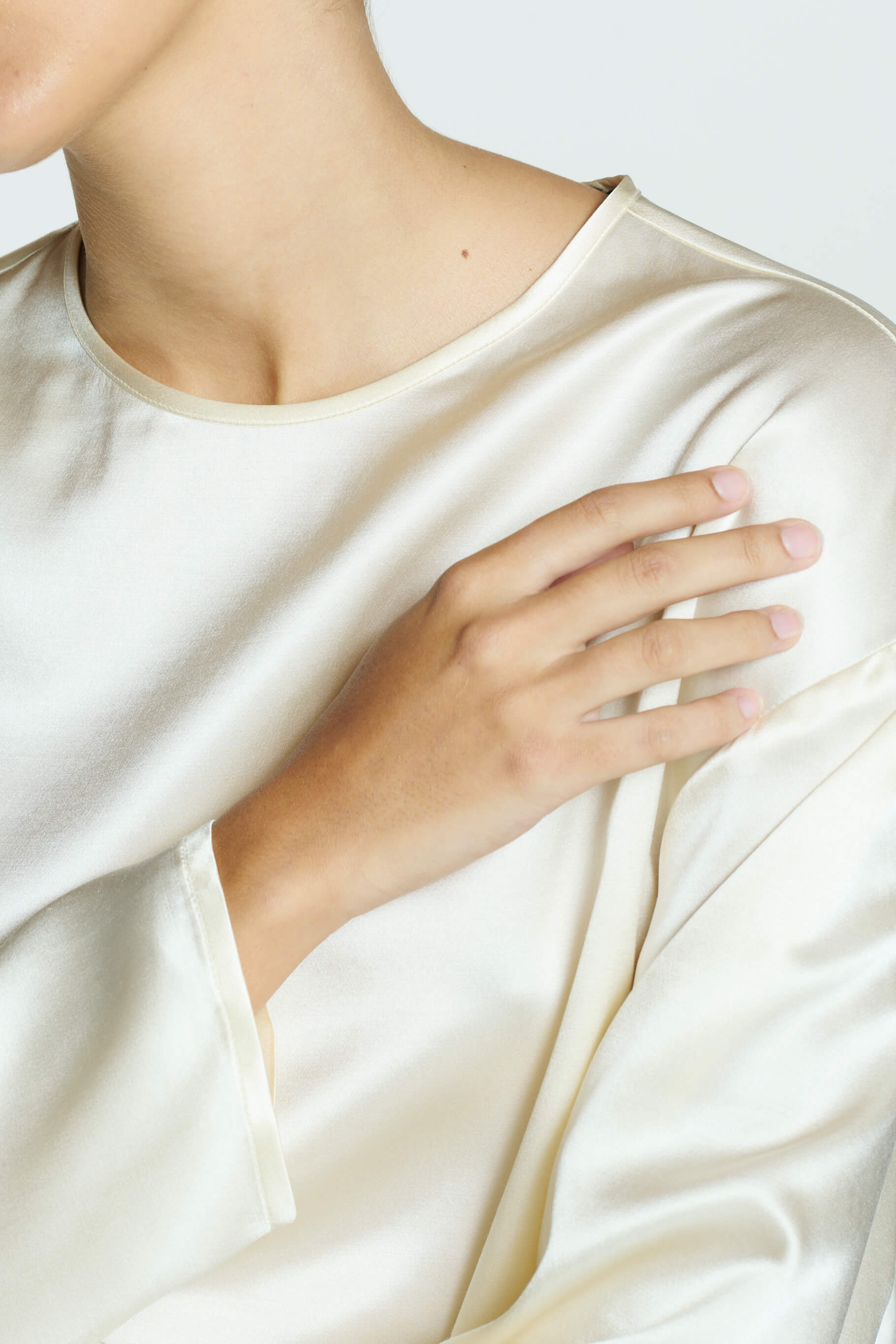 Gentle Hand Washing Preserves Silk's Strength, Sheen, and Graceful Drape