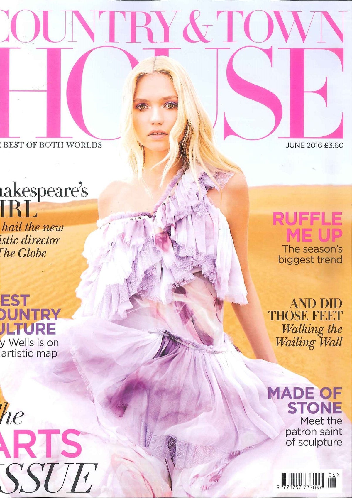 Young woman with long blonde hair in a light lavender ruffled dress, set against a warm outdoor background