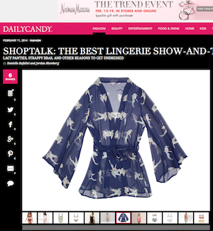 Sheer blue women's lingerie robe with white floral pattern and wide flowy sleeves, tied at the waist with matching belt
