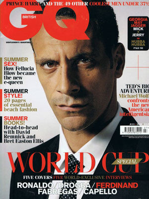 Close-up of a man in a dark suit, white shirt and black tie on the British GQ magazine cover with bold red logo