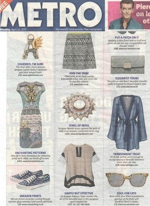 Metro newspaper fashion page showing patterned dress, sneakers, jewellery, sheer blue jacket, and sunglasses in grid