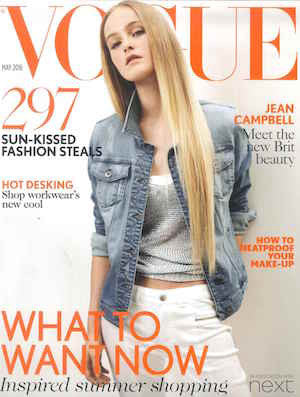 Young woman in light blue denim jacket over silver top and white shorts on a Vogue magazine cover